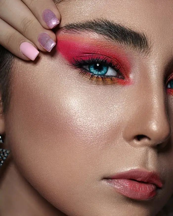 Close-up Photo of Woman with Pink Eyeshadow